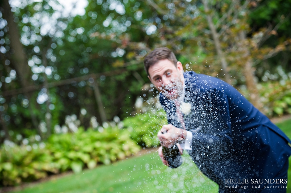Village Club of Bloomfield Hills Weddings, shooting champaign at camera